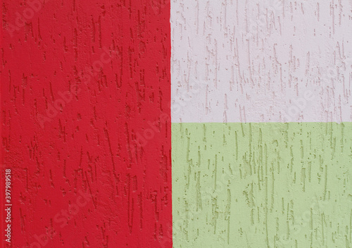 Colorful (red, white and green) painted decorative wall as background, texture © yulyao