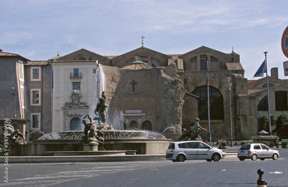 View of The Basilica of St. Mary of the Angels and the Martyrs with the fountain in Rome, Italy. 