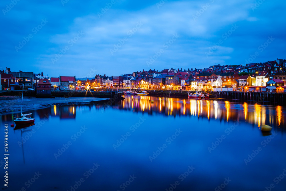 Evening view over harbour of Whitby,  Yorkshire,  United Kingdom