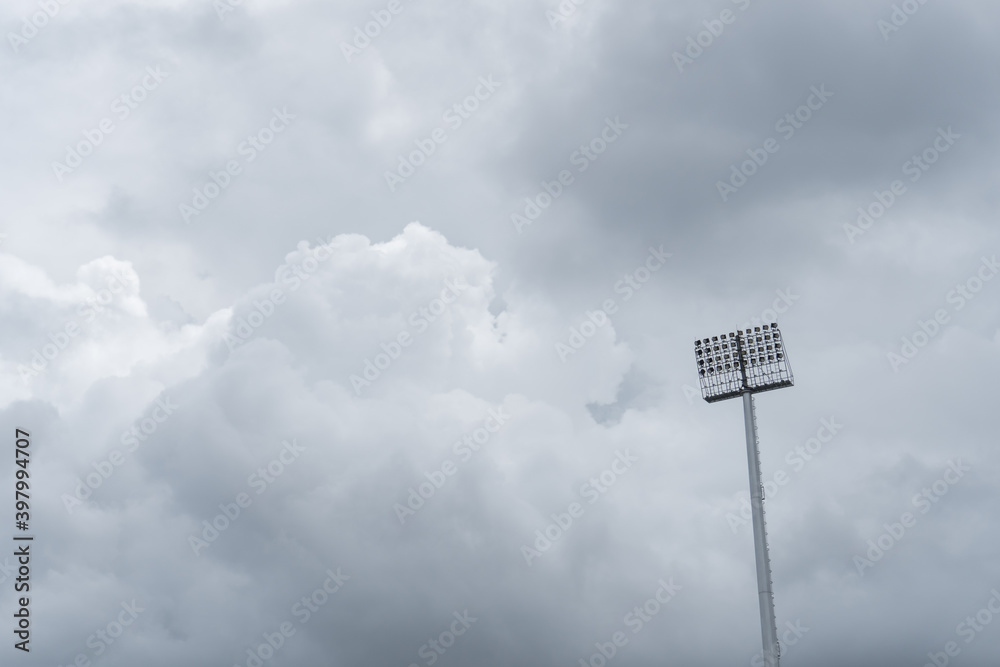 Rain cloud with spotlight lamp post for text background Rain cloud with spotlight lamp post for text background