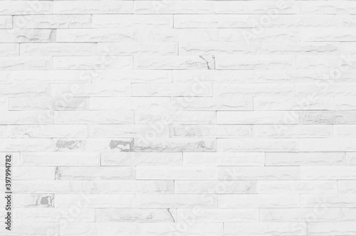 White grunge brick wall texture background for stone tile block painted in grey light color wallpaper modern interior and exterior and room backdrop design