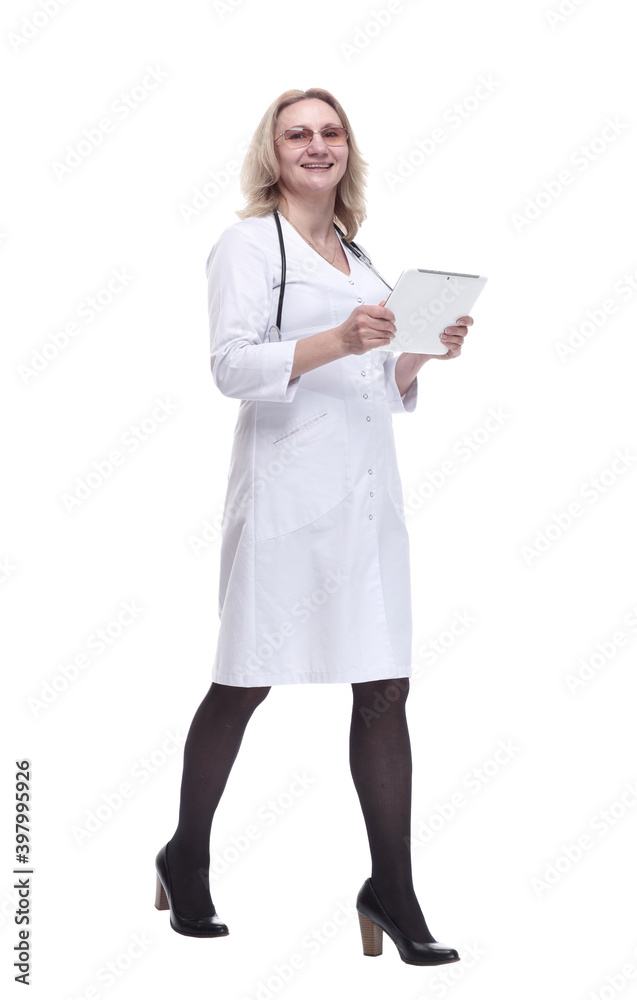 qualified doctor with a digital tablet stepping up to you. qualified doctor with a digital tablet stepping up to you.