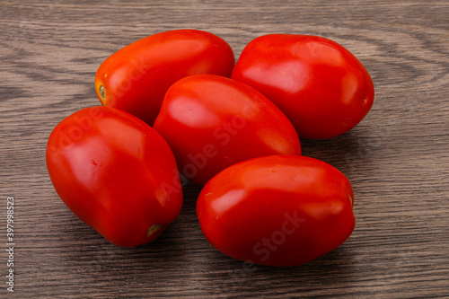 Red bright tasty tomato heap