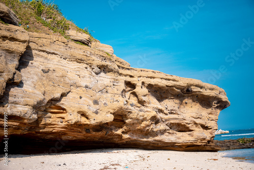 Wavy Cave ( Cau Cave) with Great cliffs on Ly Son Island, Quang Ngai Province, Vietnam photo