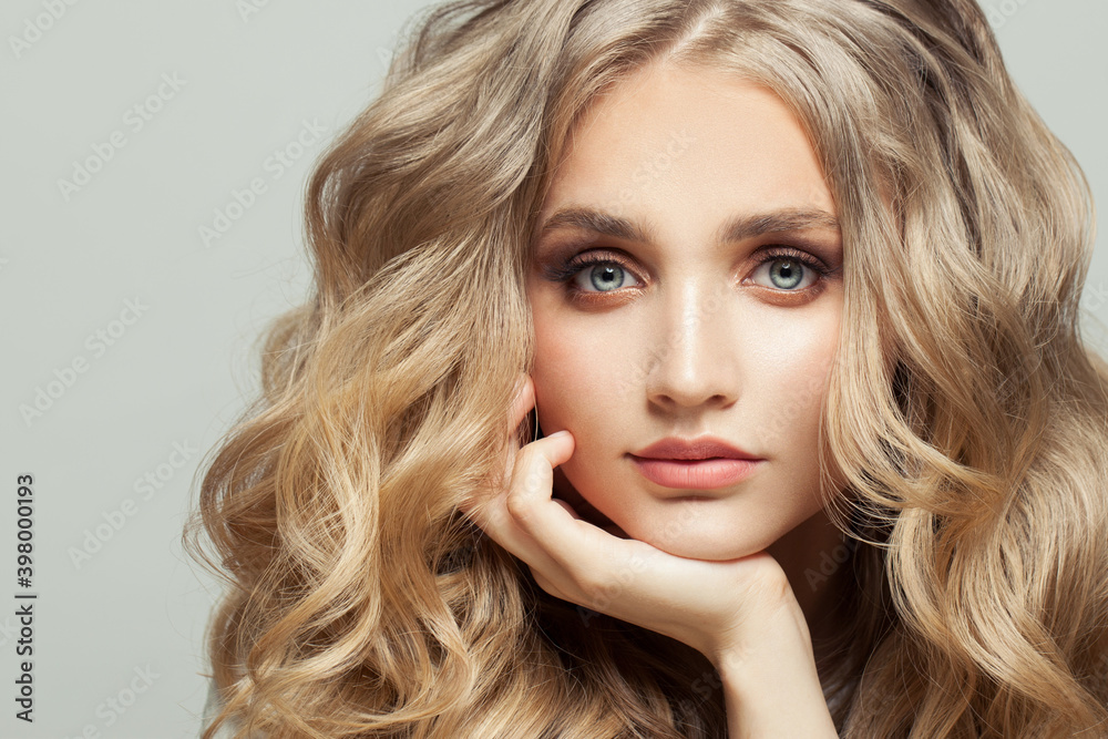 Fototapeta premium Beautiful young face close up on white