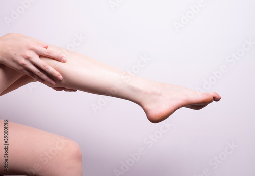 massage of leg muscles with hands  leg pain