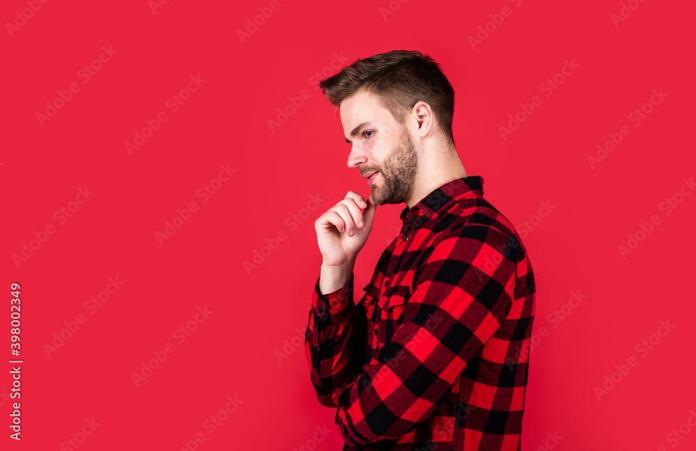 well groomed hairstyle. male beauty and fashion look. hipster checkered shirt for bearded guy. unshaven handsome man with bristle. hairdresser concept. young and confident