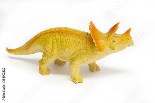 Fototapeta Naklejka Na Ścianę i Meble -  Triceratops plastic model toy in white background