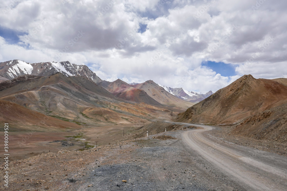 Naklejka premium Scenic pastel color mountain landscape along Pamir Highway at high-altitude Ak Baital pass, Murghab district, Gorno-Badakshan, Tajikistan