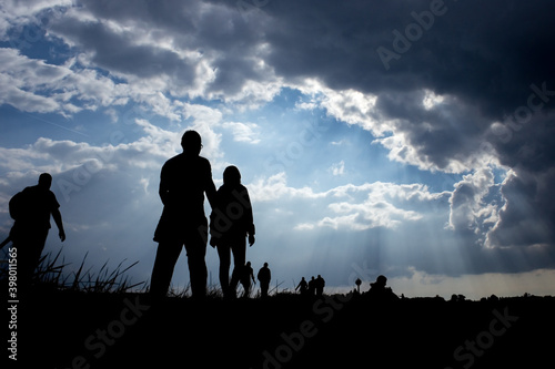 Silhouette of the emigrants on the way photo