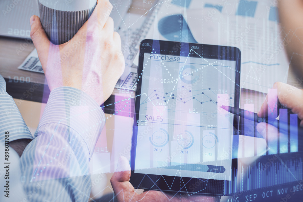 Double exposure of man's hands holding and using a phone and financial chart drawing. Market analysis concept. Double exposure of man's hands holding and using a phone and financial chart drawing. Market analysis concept.