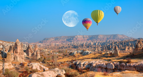 Hot air balloon flying over spectacular Cappadocia - Goreme, Turkey