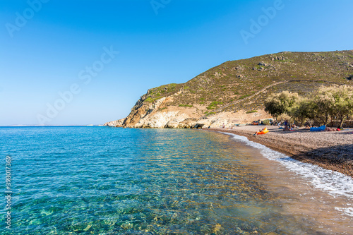 Agios Nikolaos beach is famous with colored pebbles in Patmos Island photo