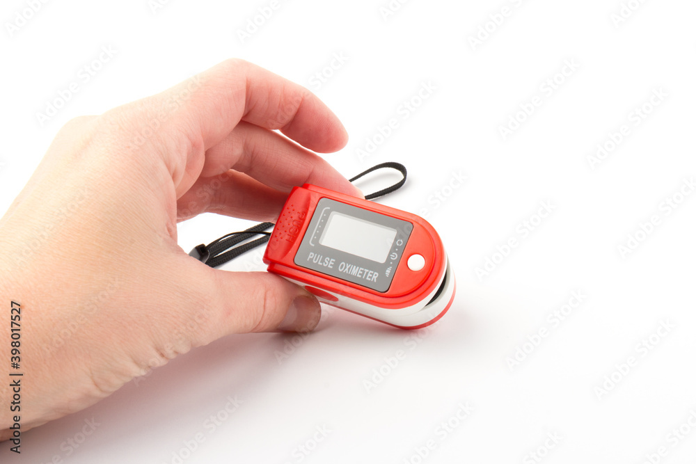 Pulse Oximeter, finger digital device to measure oxygen saturation in blood. Coronavirus symptoms concept. Pulse Oximeter, finger digital device to measure oxygen saturation in blood. Coronavirus symptoms concept.