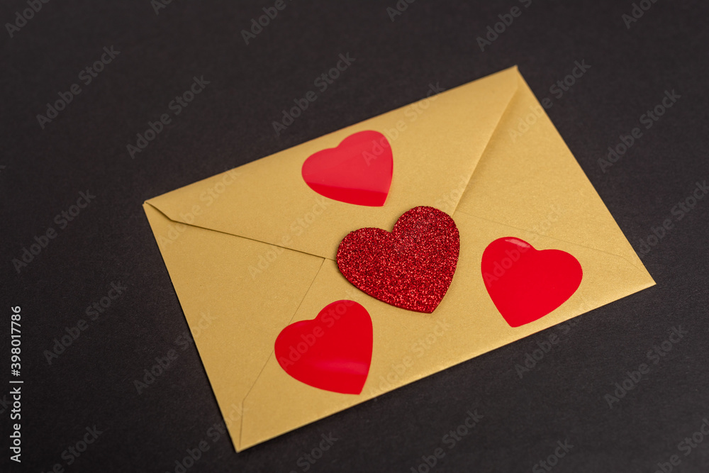 envelope with hearts isolated on black envelope with hearts isolated on black