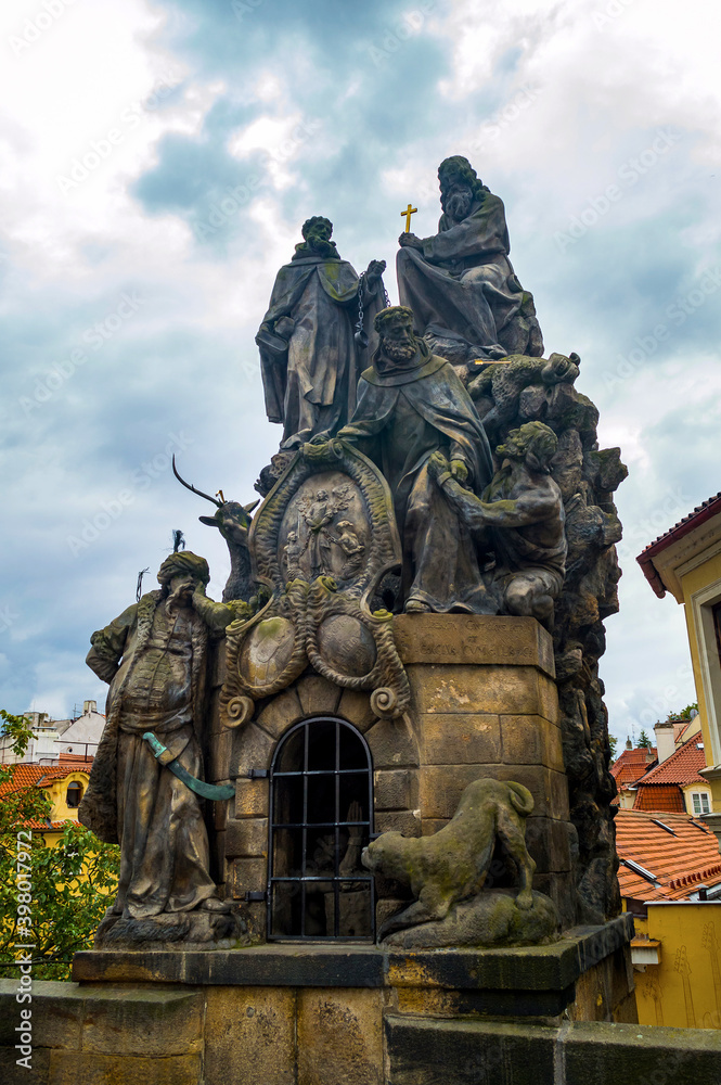 Czech, Prague, gothic sculpture of the Cyril and Methodius on the Charles bridge. Prague, medieval art, statue of Saint on the bridge of King Charles.