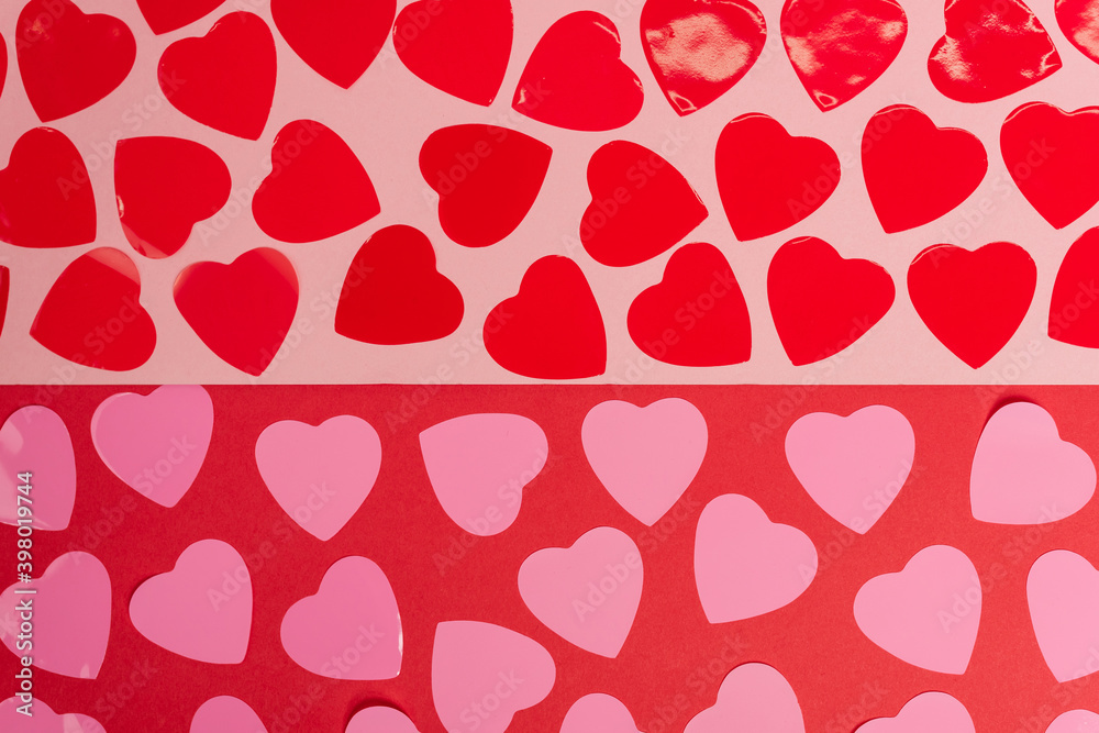 top view of hearts on red and pink background top view of hearts on red and pink background