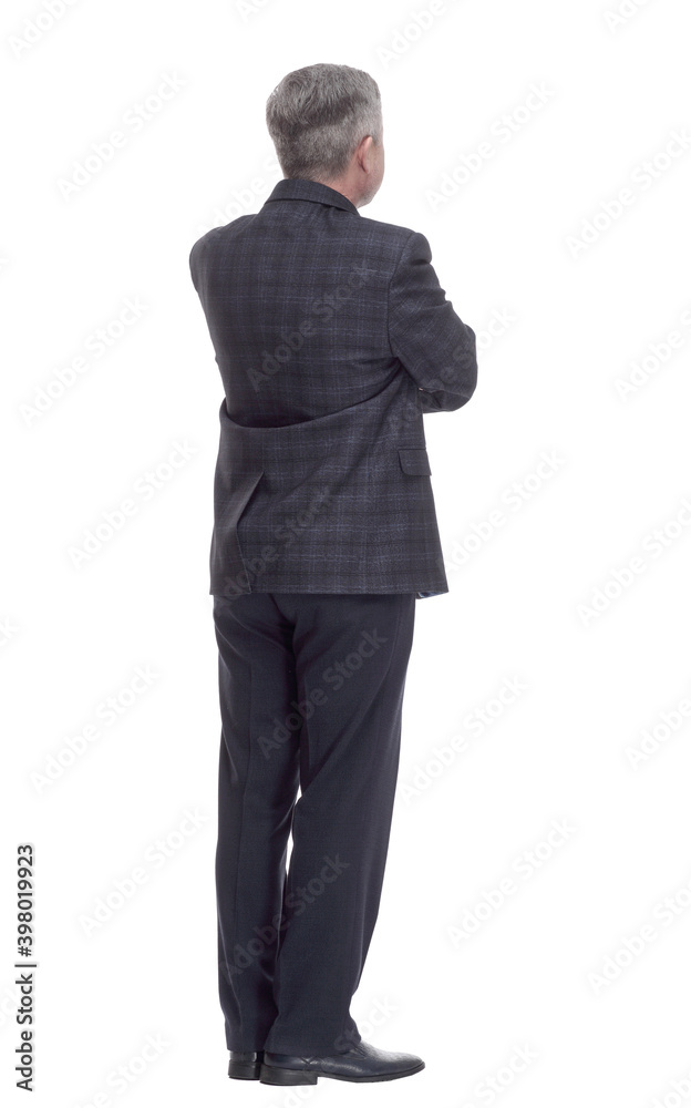 rear view. adult casual male reading an ad on a white screen rear view. adult casual male reading an ad on a white screen