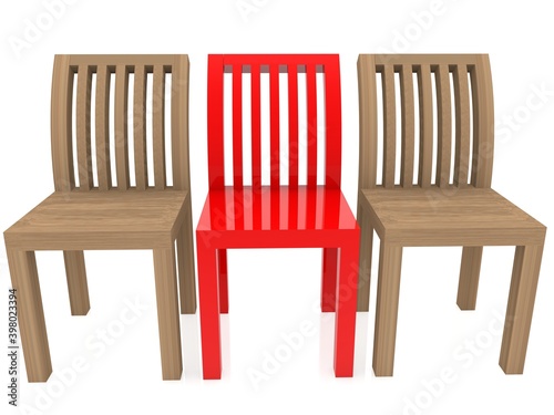 Red chair between wooden chairs