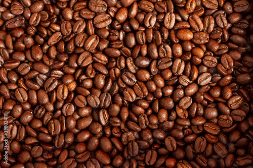 Roasted coffee beans texture. © Сергей Рамильцев