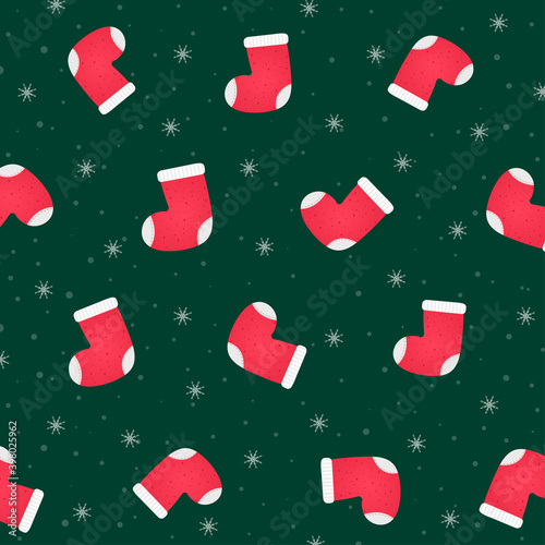 Christmas stocking socks Seamless pattern. Xmas red and white socks on snowflakes green background. vector illustration.