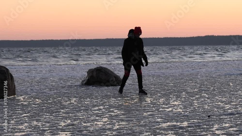 dangerous children play on thin ice on the lake