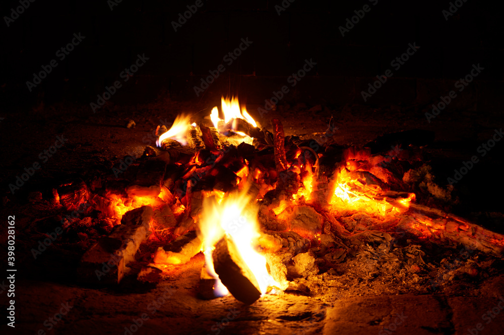 Burning embers inside a wood oven for food processing Burning embers inside a wood oven for food processing