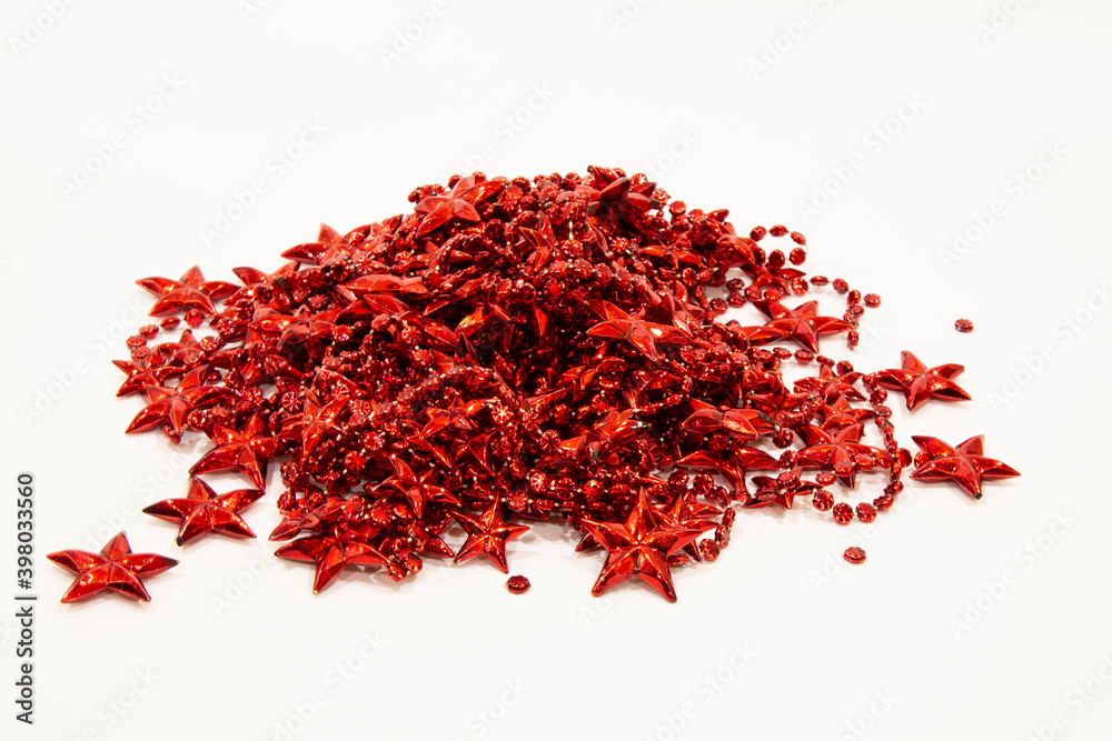Naklejka premium Red tinsel sparkles with Christmas and new year backgrounds. Christmas decorations