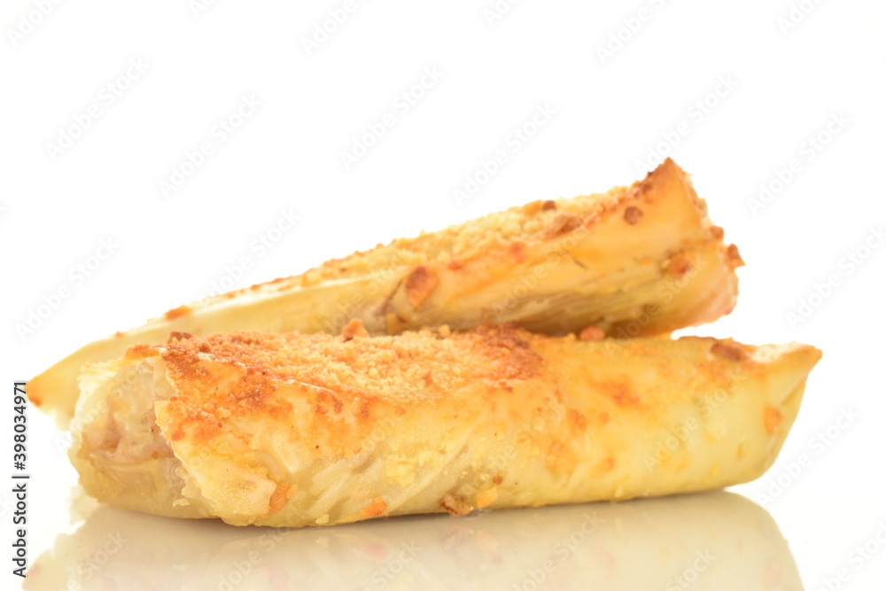 Several mini strudel with an apple, close-up, on a white background. Several mini strudel with an apple, close-up, on a white background.