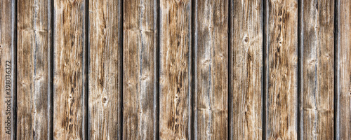 Panoramic wood texture. Wooden desk pattern. Website header panoramic view. Rustic tree desk with knots pattern. Countryside architecture wall. Village building construction. Wood industry texture.
