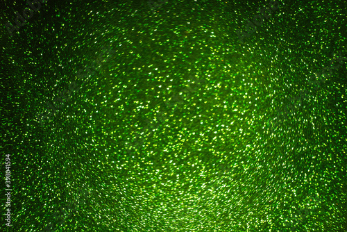On black isolated background texture of green defocused hearts bokeh. Greeting card. Banner for website, poster. Template preparation for Valentine's, Mother's, St. Patrick's Day, March 8. Copy space