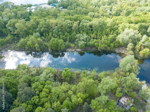 Aerial drone view. Pond in the city.