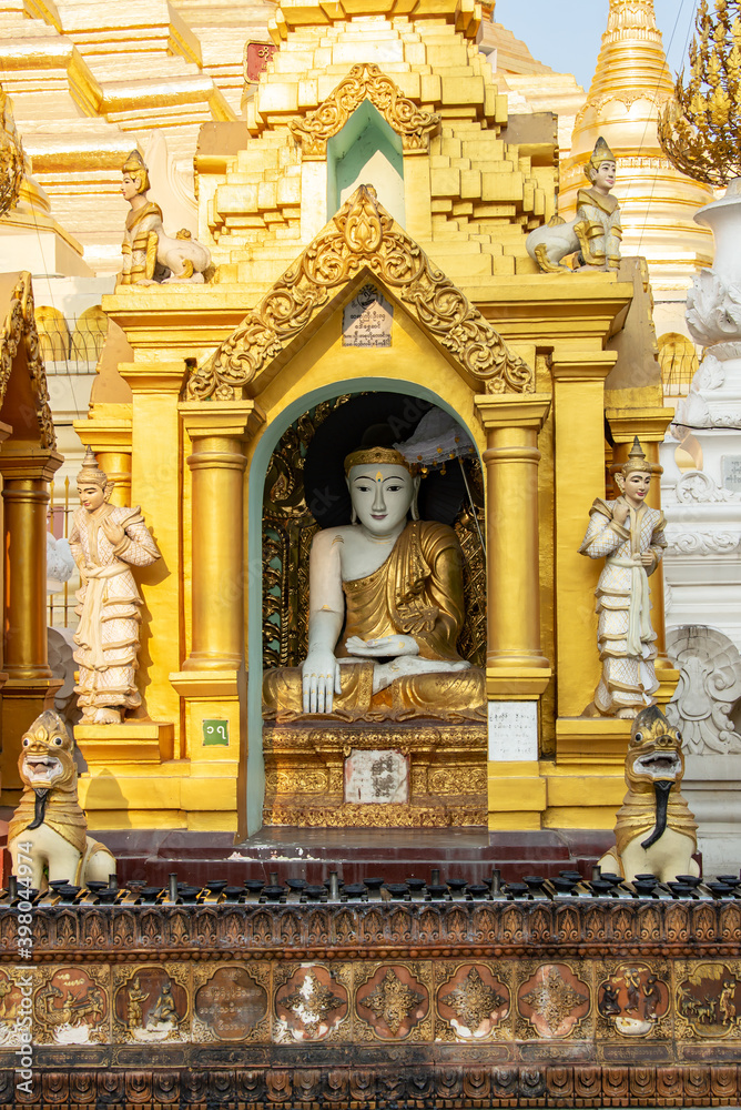 Buddha statue at Shwedagon pagoda, in Yangon Burma Myanmar