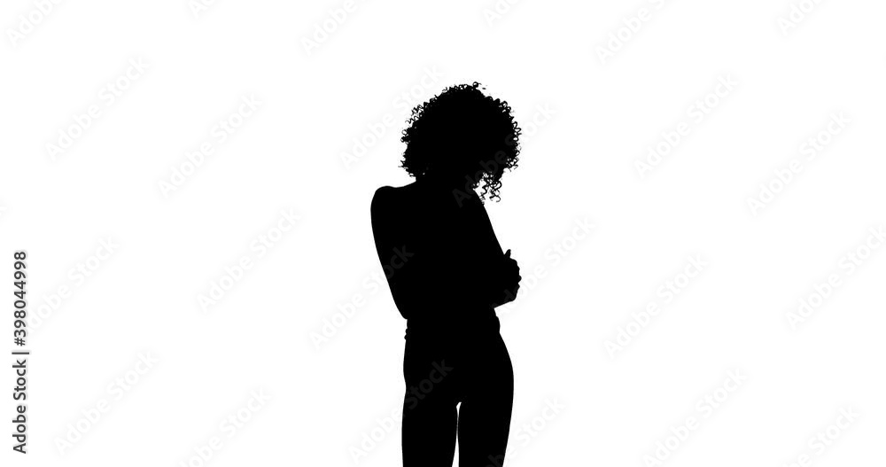 Cropped silhouette of slim dancing woman, touching her curly hair and raising hands. Improvisation. Modern contemporary style concept. Isolated on white background. Cropped silhouette of slim dancing woman, touching her curly hair and raising hands. Improvisation. Modern contemporary style concept. Isolated on white background.