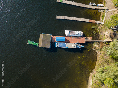 Aerial drone view. Boat at the pier. © Sergey