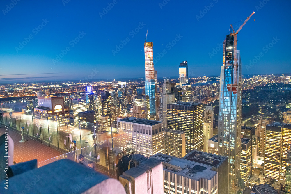 Naklejka premium NEW YORK CITY - DECEMBER 7, 2018: Night skyline of Midtown Manhattan, aerial view at night