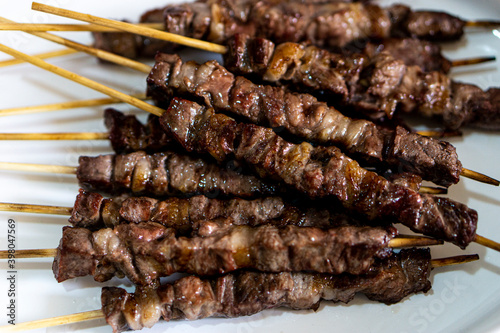 Delicious meat skewers prepared for grilling