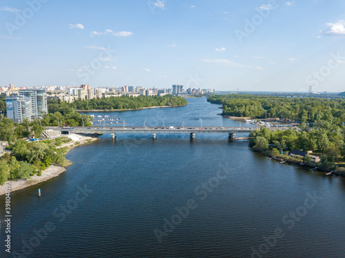 Aerial drone view. Automobile bridge over the Dnieper river in Kiev.