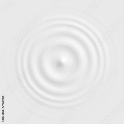 Drop falling into milk, lotion or paint top view