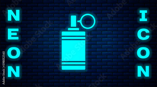 Glowing neon Hand grenade icon isolated on brick wall background. Bomb explosion. Vector.