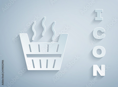 Paper cut Sauna bucket icon isolated on grey background. Paper art style. Vector.