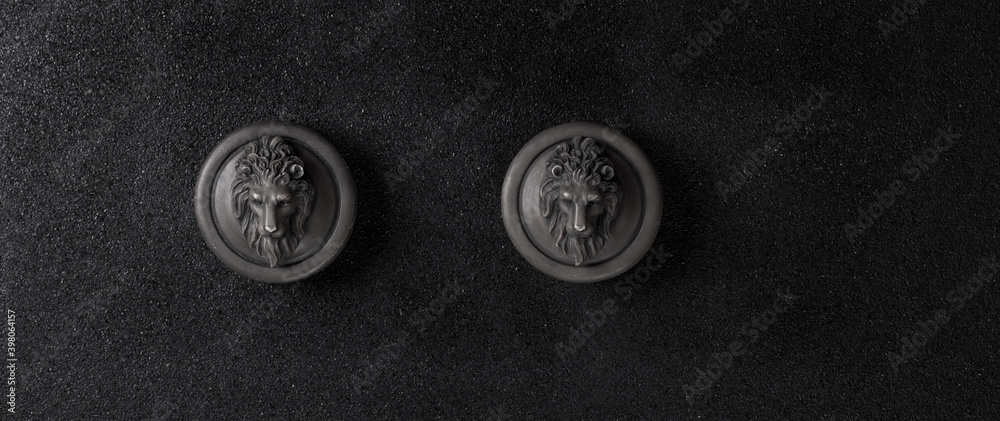 ceramic lion sculptures on black background ceramic lion sculptures on black background