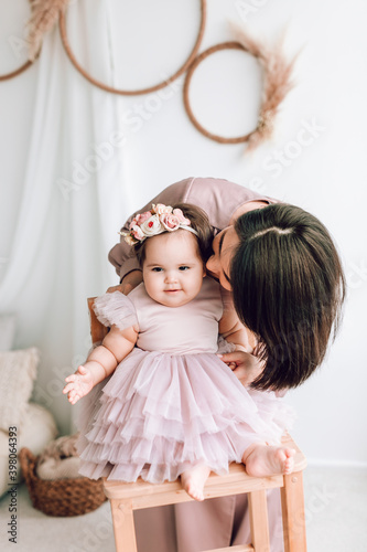 Happy loving family. Mother and daughter are smiling and having fun