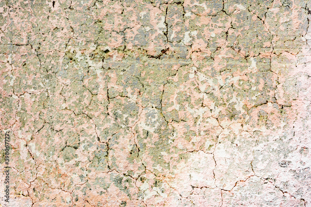 Texture of a concrete wall with cracks and scratches which can be used as a background Texture of a concrete wall with cracks and scratches which can be used as a background