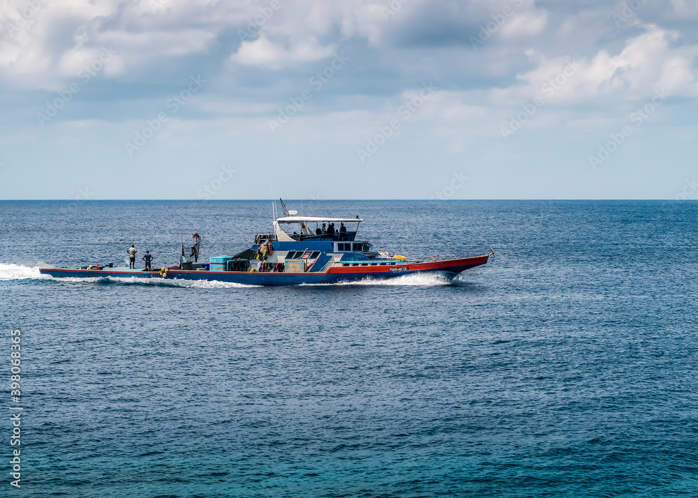 Fishing boat near the island Fulahmulah of Maldives archipelago