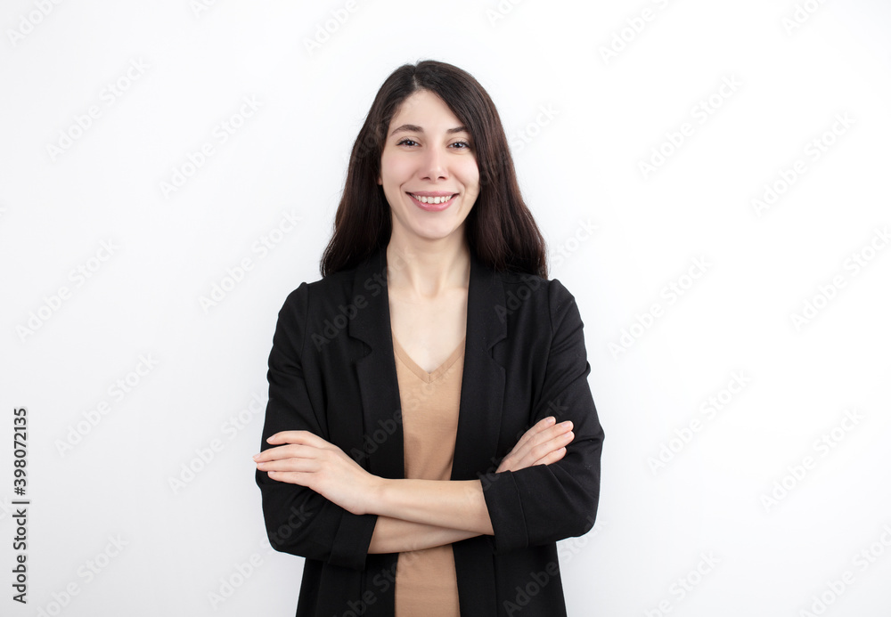 Smiling confident business woman posing with folded arms. Happy business woman in formal suit standing for camera on white studio background. Corporate portrait concept.
Smiling confident business woman posing with folded arms. Happy business woman in formal suit standing for camera on white studio background. Corporate portrait concept.