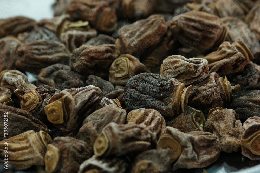 Natural dried figs background. Healthy organic fruits texture. Healthy eating concept. Natural dried figs background. Healthy organic fruits texture. Healthy eating concept.