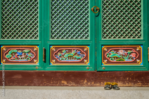Shoes in front of buddhist temple photo