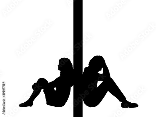 Silhouettes of pensive man and woman sitting by the wall