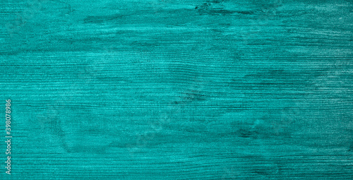 Wooden green textured background in the trendy Tidewater Green color. copy space, color trend, board surface